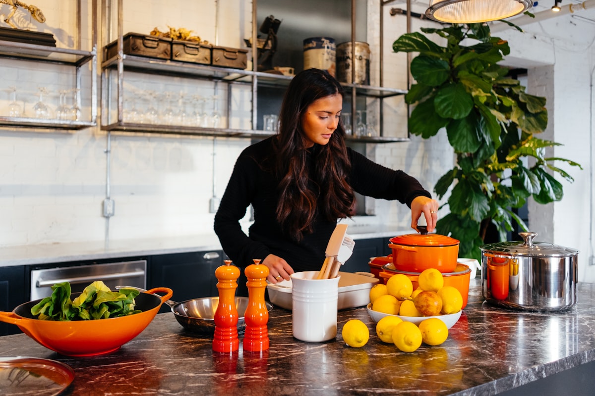 A helper preparing a meal in a bright kitchen